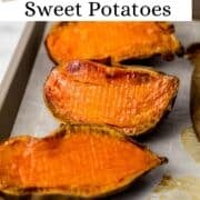 Close up view of finished potatoes on sheet pan on pin with text overlay.
