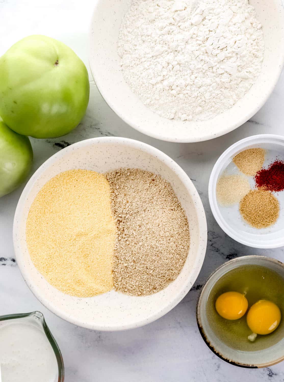 Overhead view of ingredients needed to make recipe in separate bowls. 