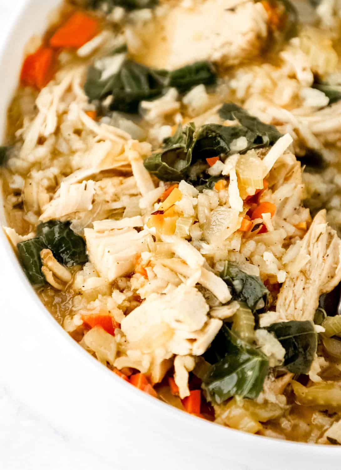 Close up side view of bowl of finished soup.